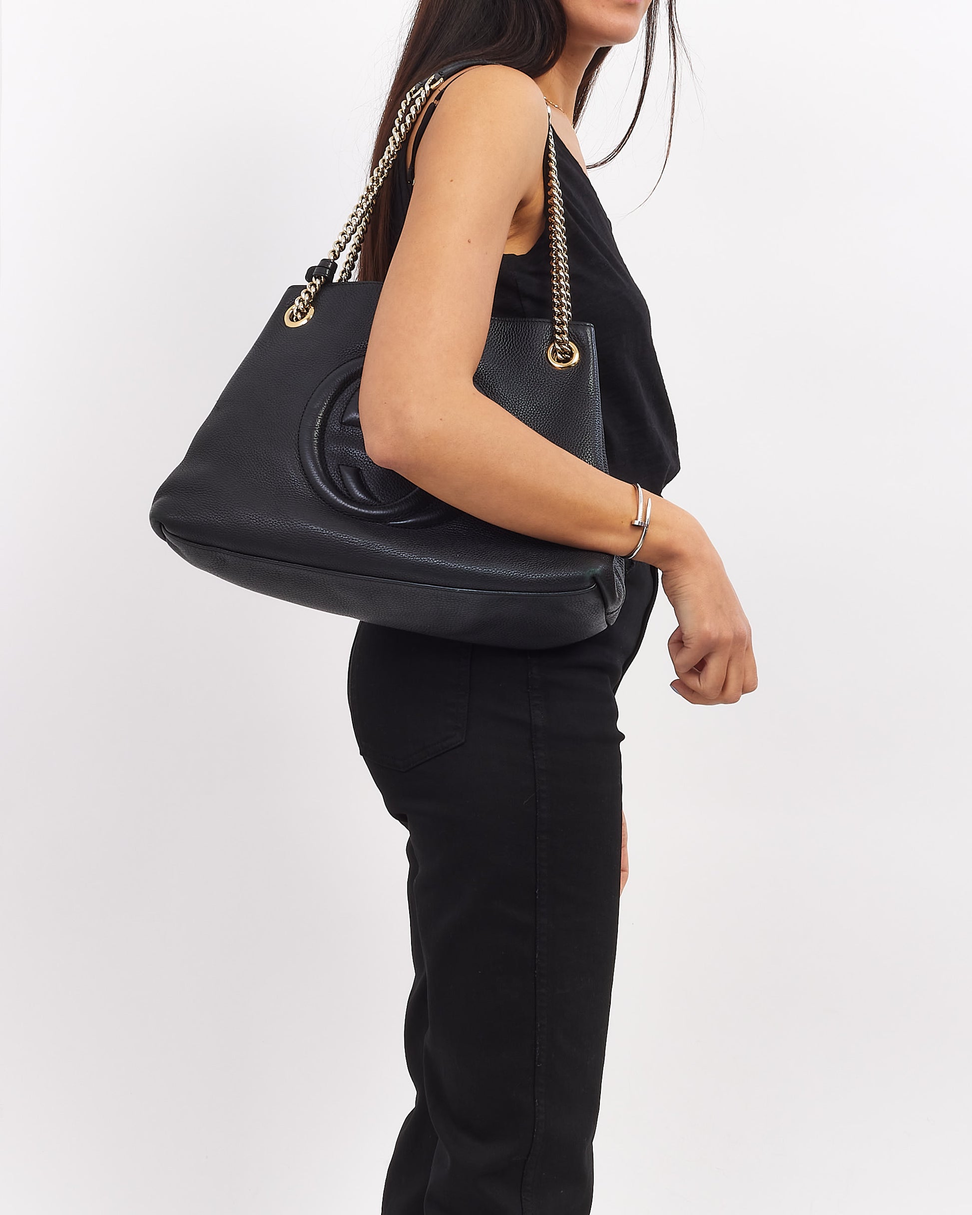 Explore a Gucci Black Pebbled Leather Medium Soho Chain Shoulder