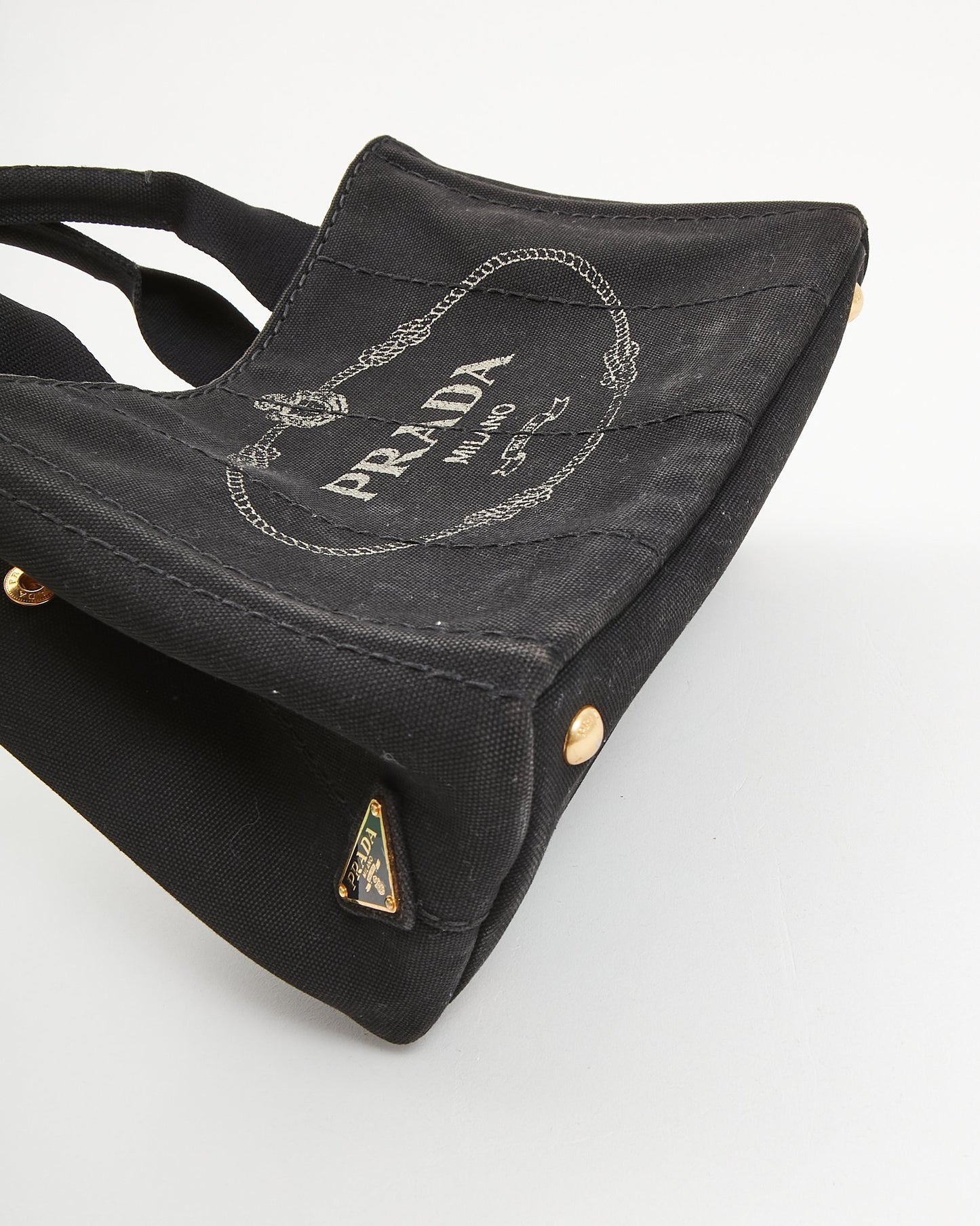 Prada Mini sac fourre-tout en toile noire avec logo Canapa