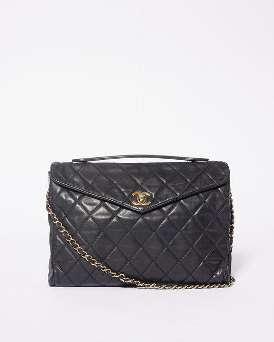 Explore a Chanel Vintage Black Lambskin Pochette Chain Shoulder