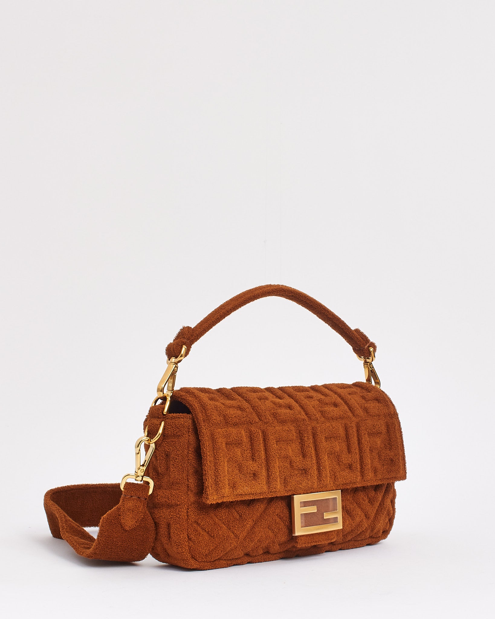 Explore a Fendi Brown Terry Cloth Fabric Baguette Bag with