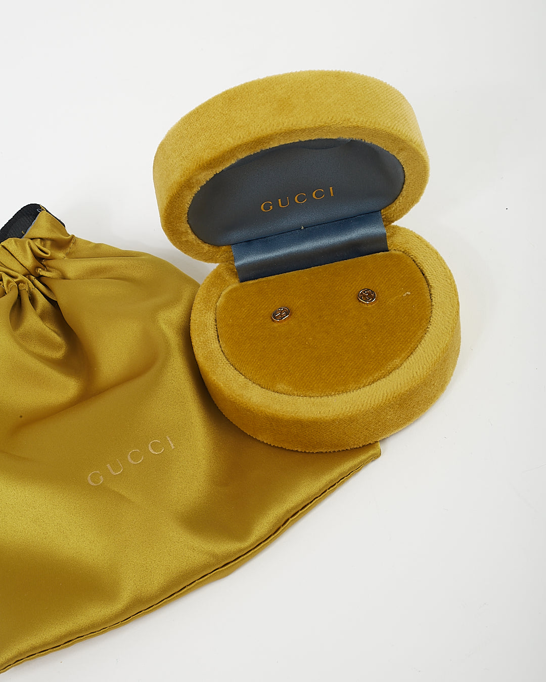 Boucles d'oreilles GG entrelacées en or jaune 18 carats Gucci