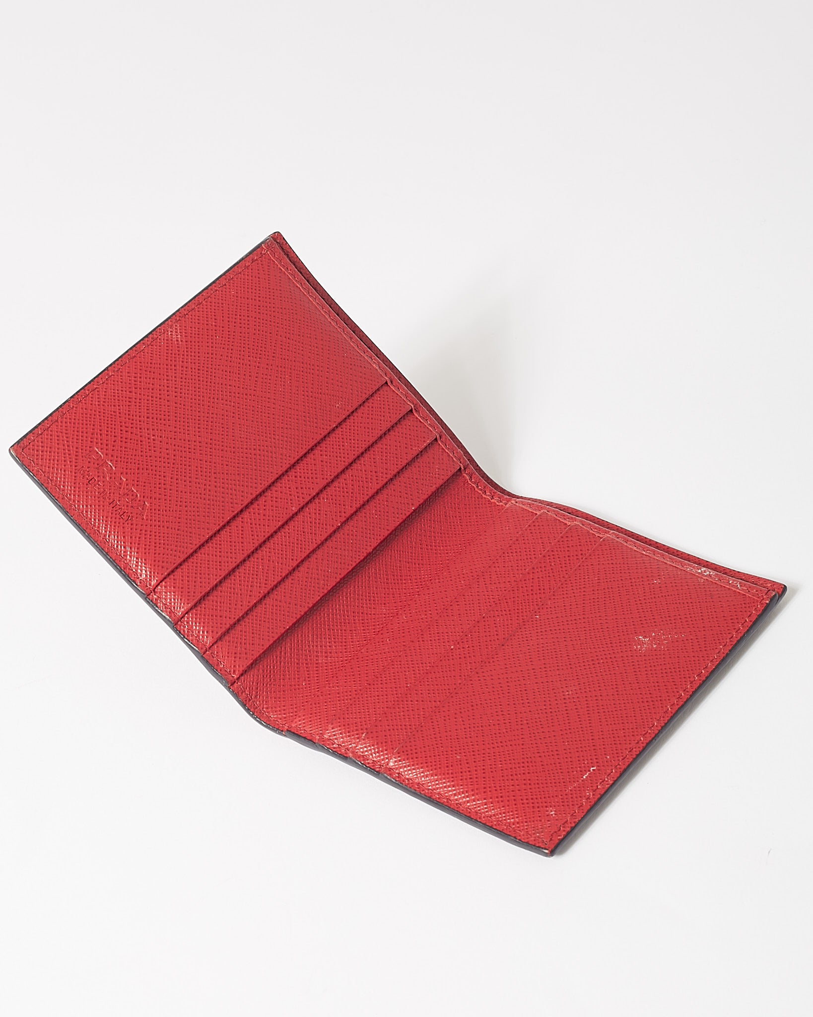 Explore a Prada Black Red Saffiano Leather Malia Monkey Wallet