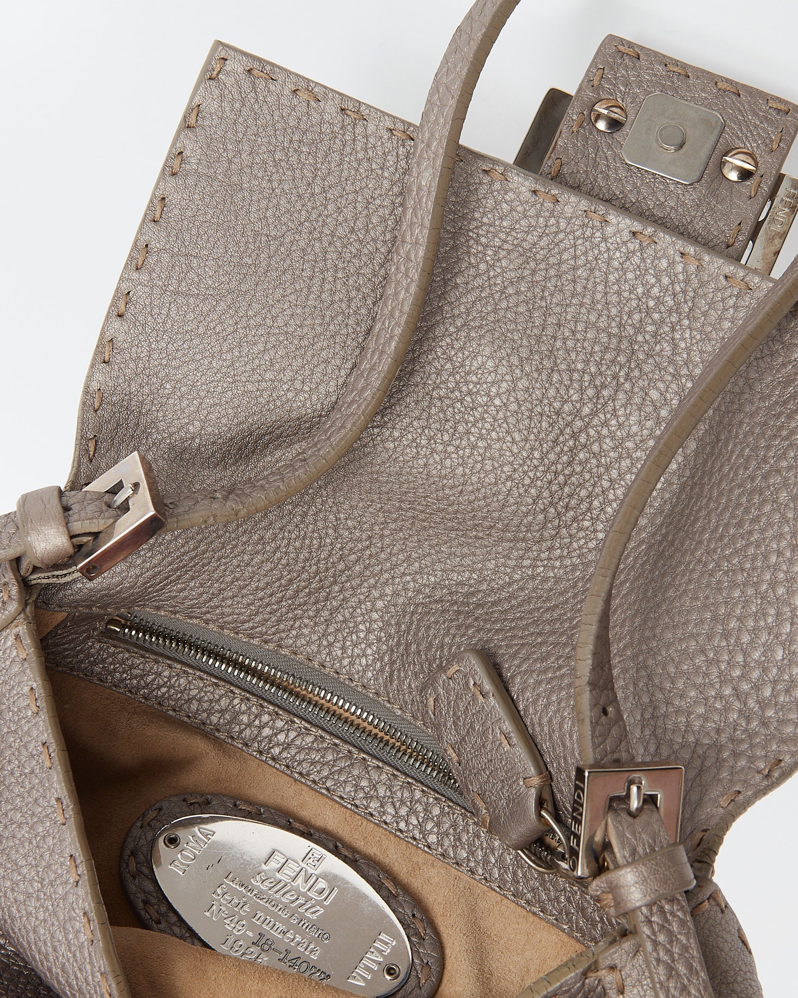 Explore a Fendi Silver Selleria Leather Mamma Baguette Shoulder