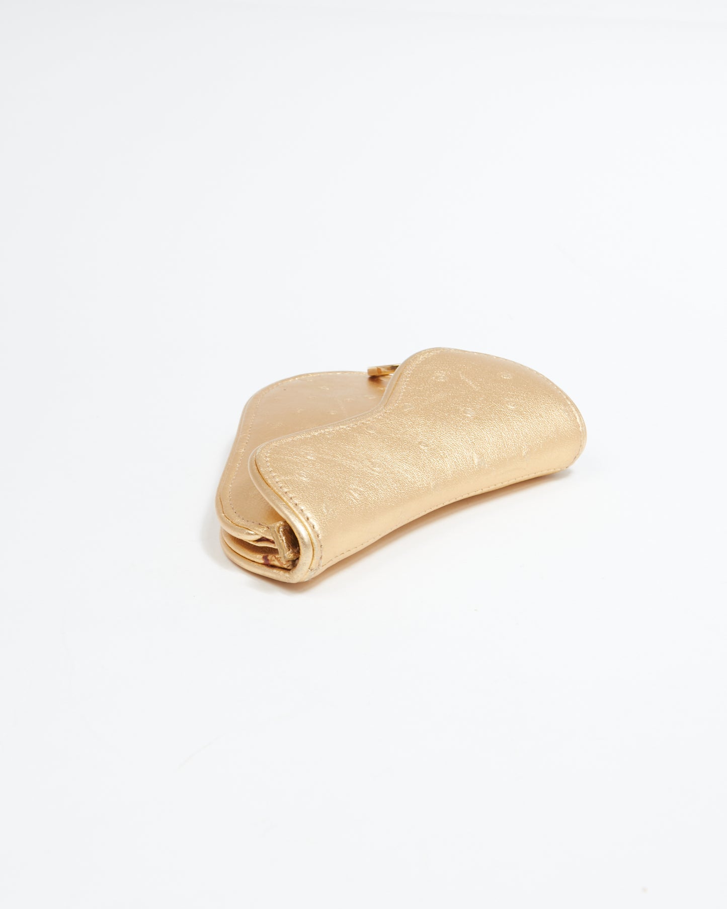 Pochette à monnaie Saddle en cuir embossé doré Dior