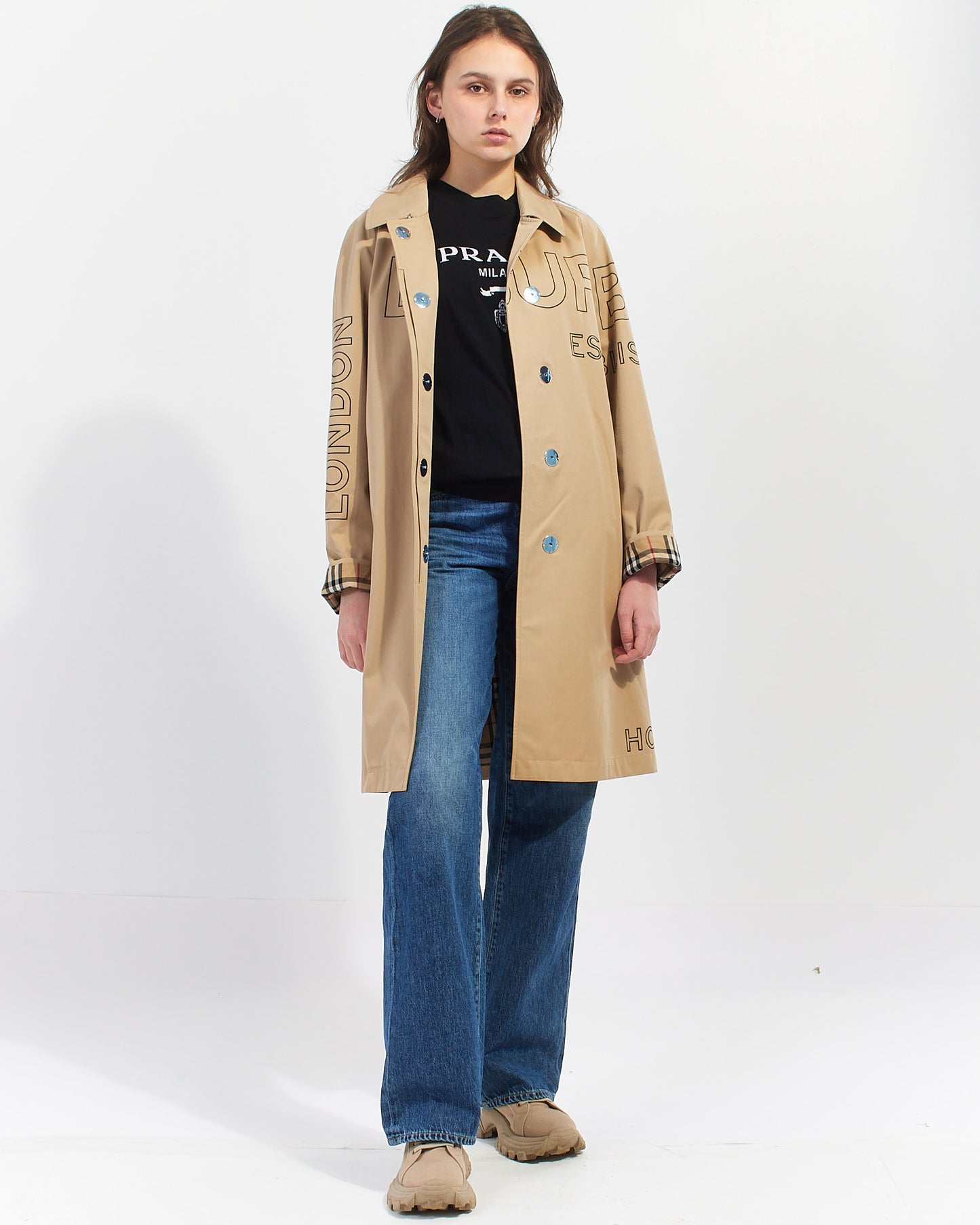 Explore a Burberry Beige Cotton Logo Beltless Trench Coat