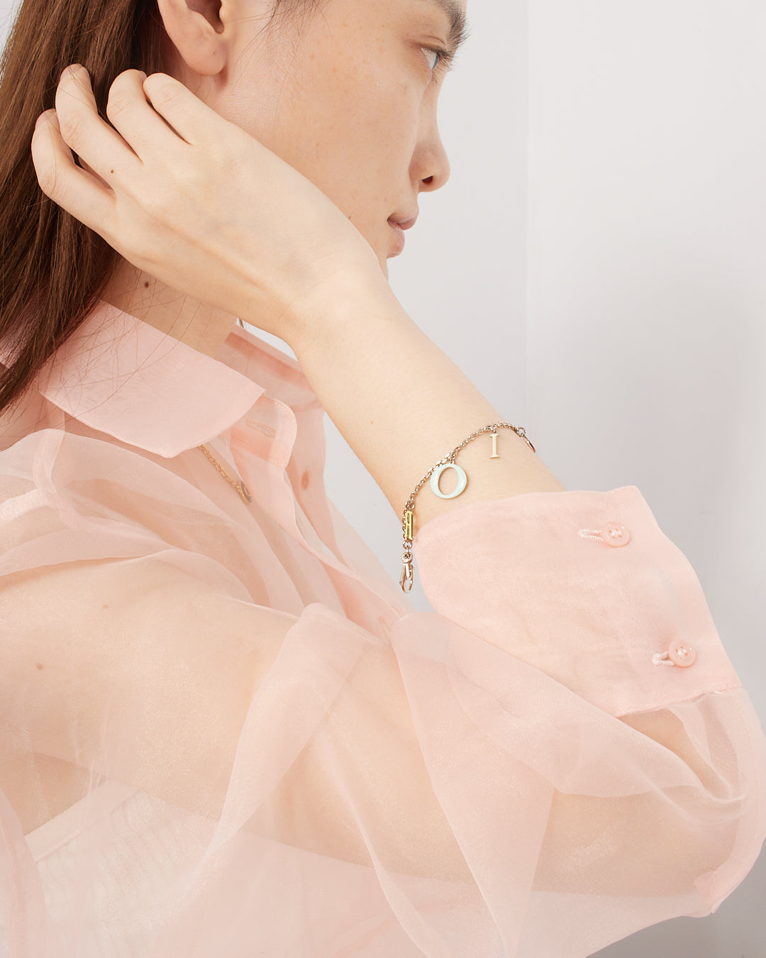 Bracelet à breloques chaîne multi-logos argenté Dior