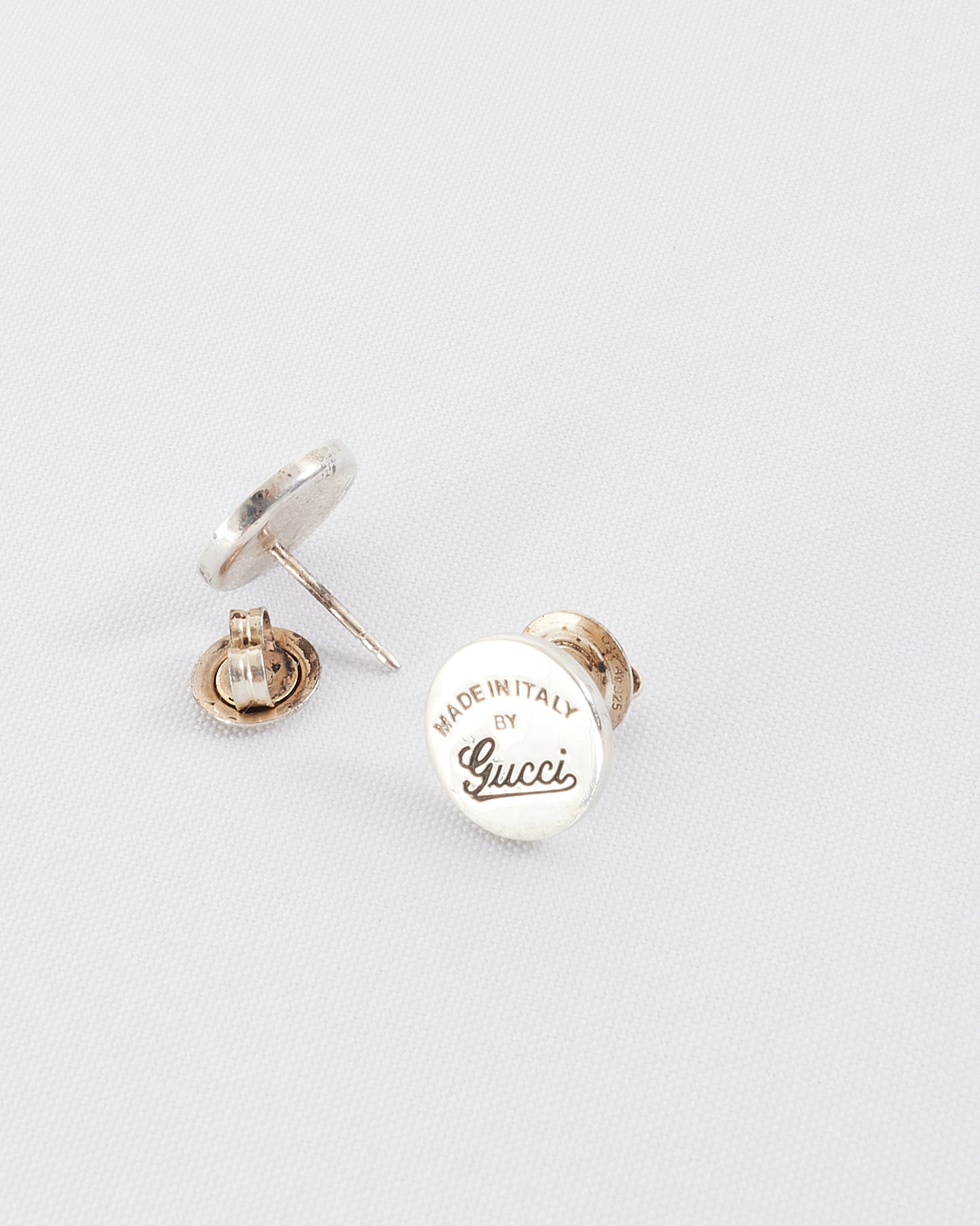 Boucles d'oreilles rondes avec logo argenté Gucci