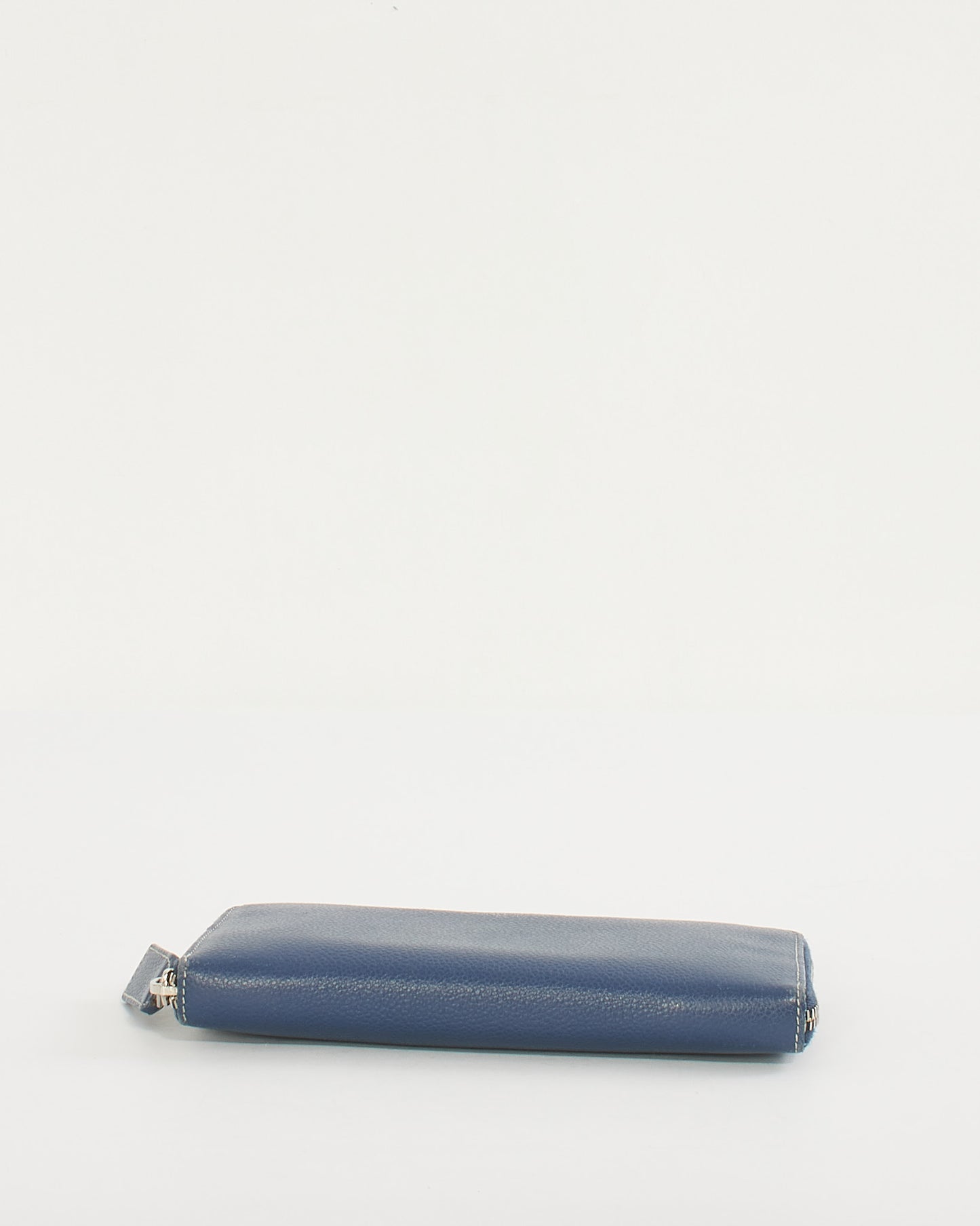 Portefeuille zippé Continental Rive Gauche en cuir grainé bleu Saint Laurent