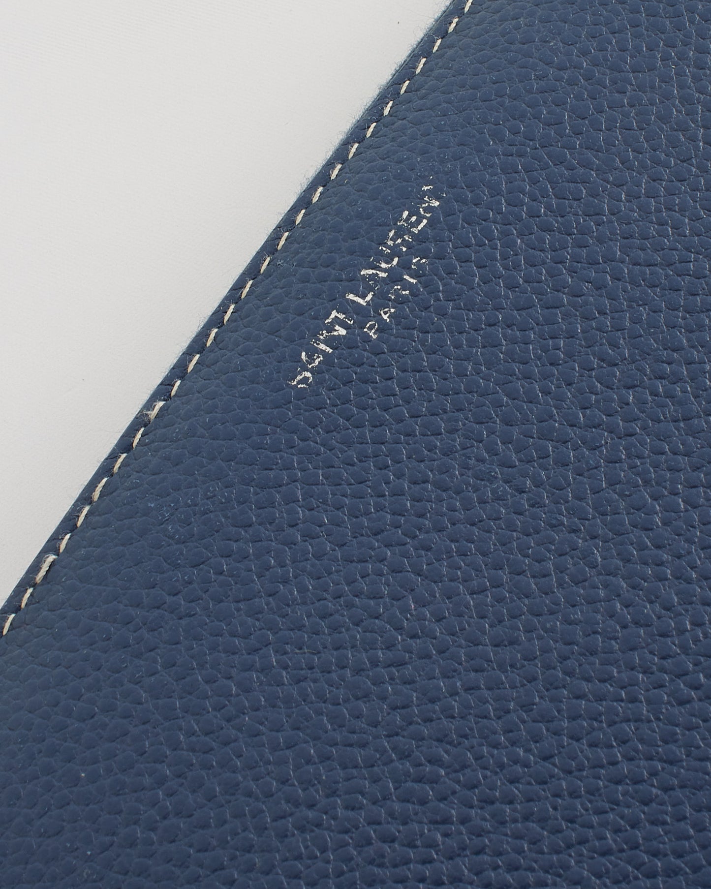 Portefeuille zippé Continental Rive Gauche en cuir grainé bleu Saint Laurent