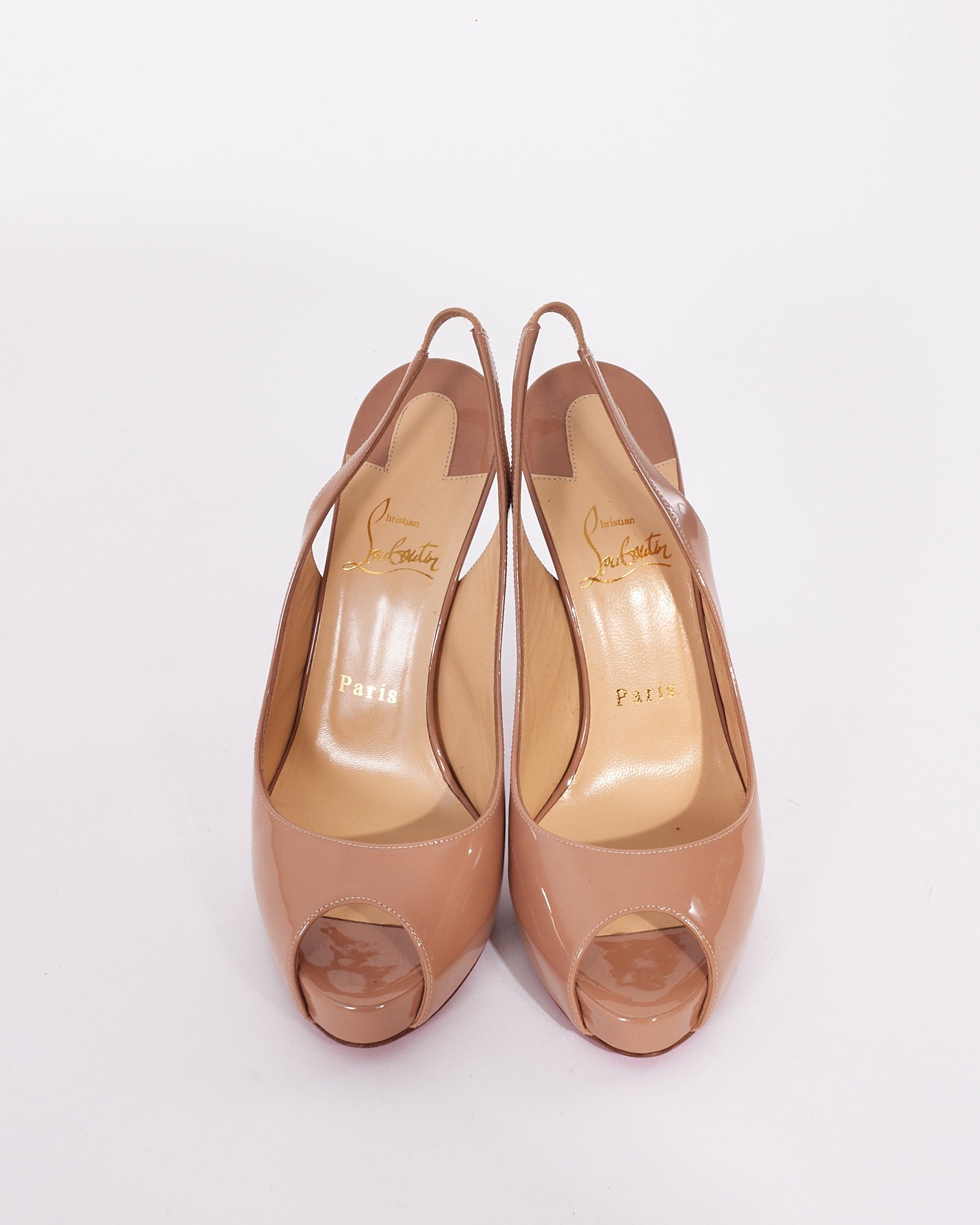 Explore a Christian Louboutin Beige Patent Leather Private Number