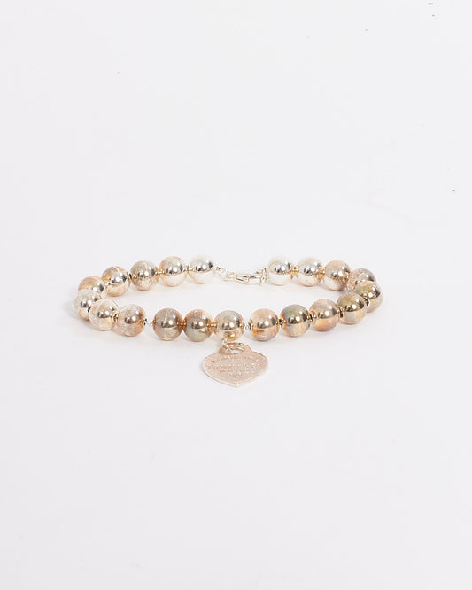 Tiffany &amp; Co. Bracelet en argent avec étiquette en forme de cœur et perles