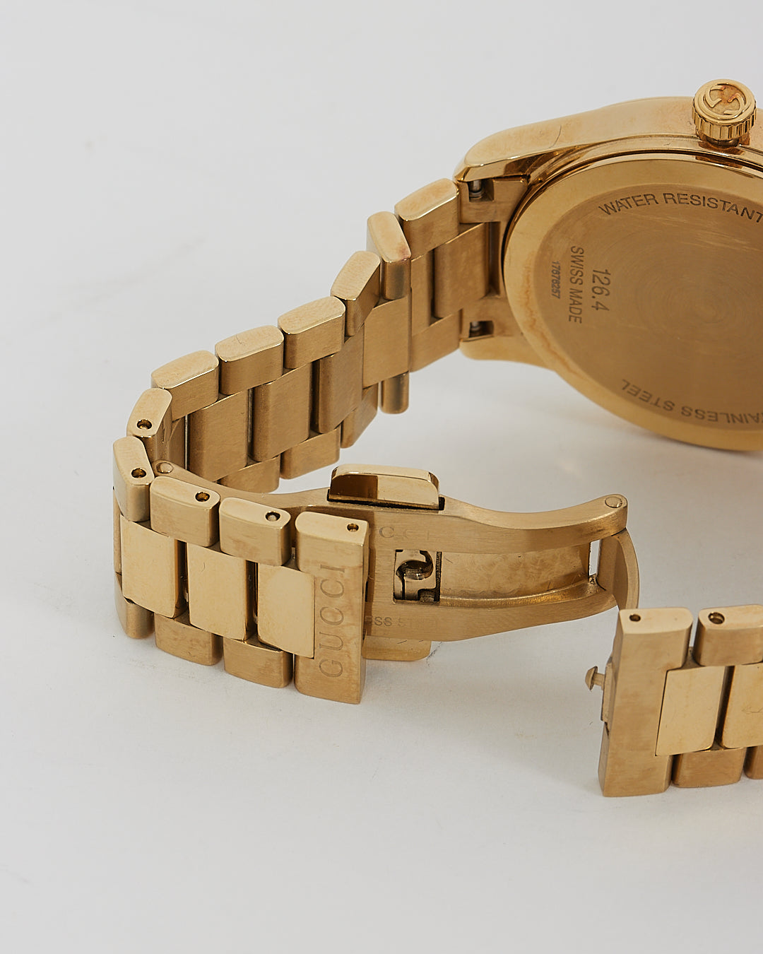 Montre Gucci en acier inoxydable doré avec cadran à strass de 38 mm