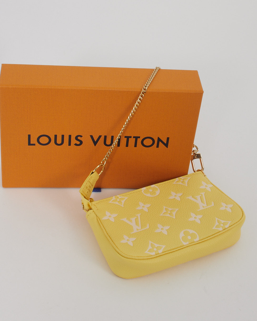 Louis Vuitton Monogram Empreinte Mini Pochette Accessoire Jaune