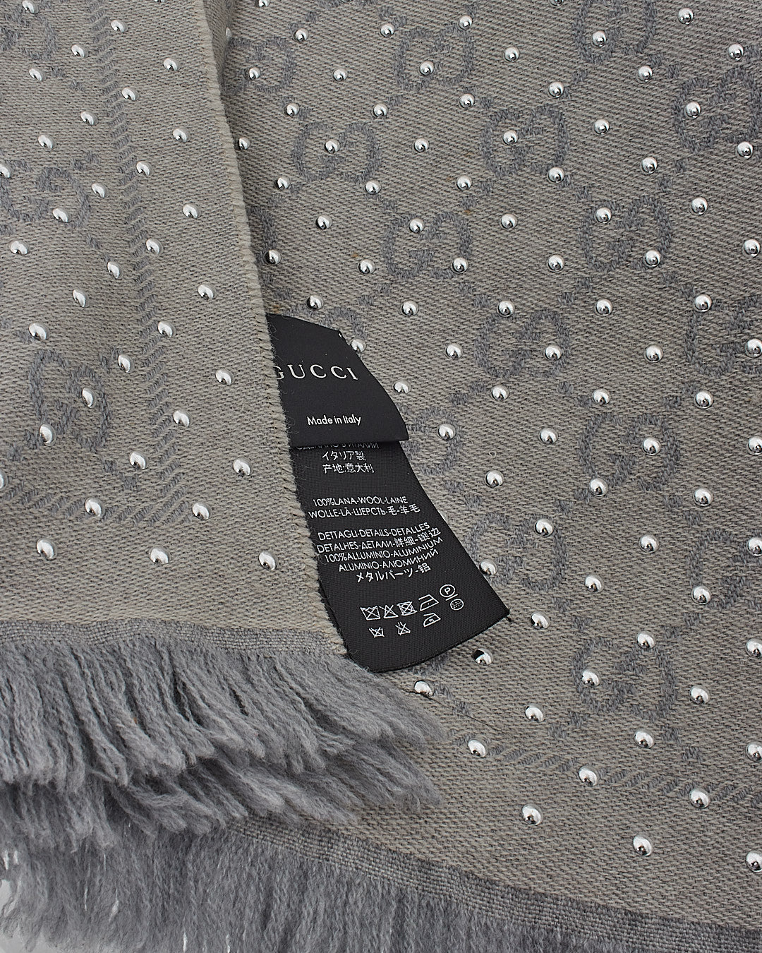 Écharpe en laine cloutée monogramme gris Gucci