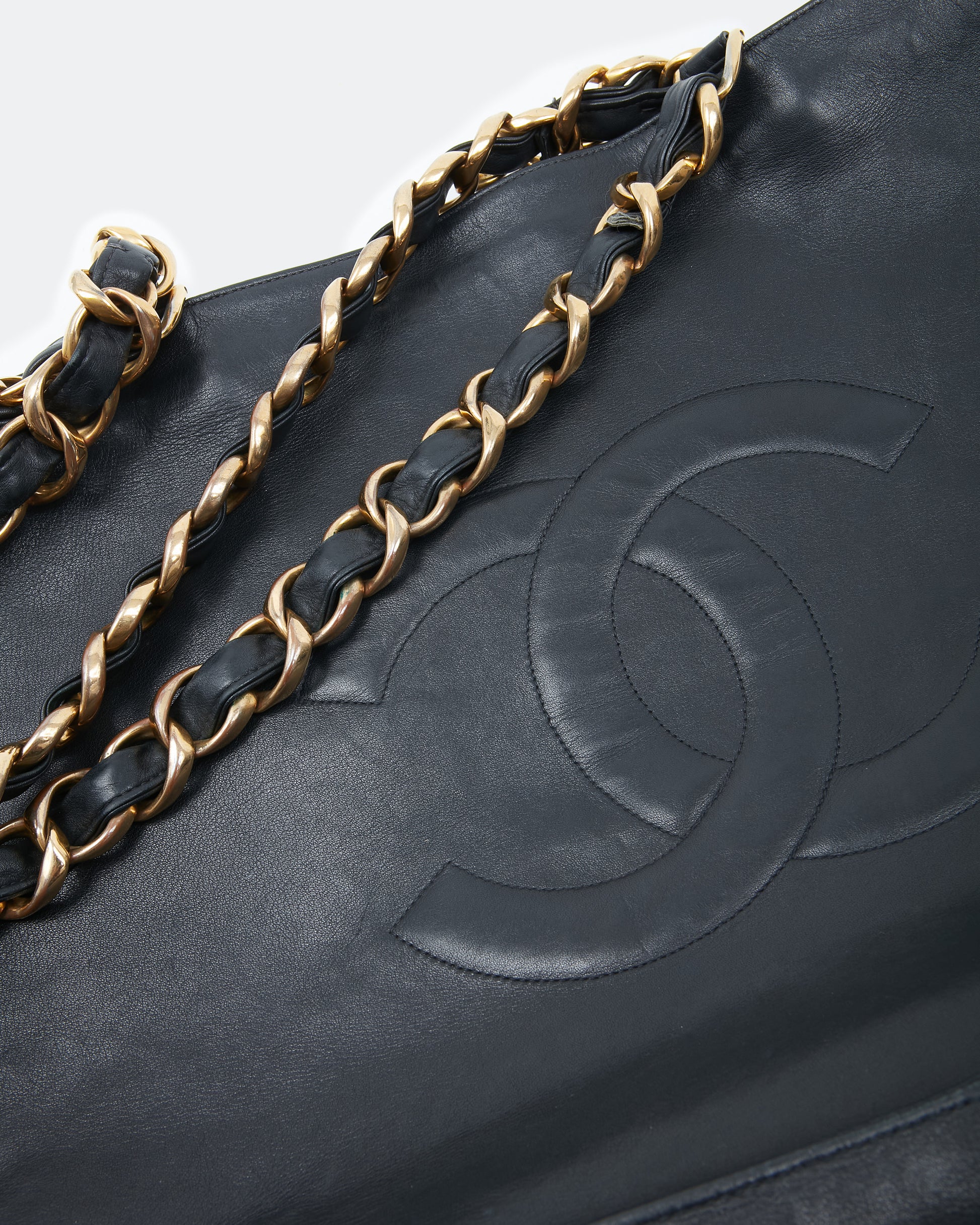 Explore a Chanel Black Lambskin Vintage 24K Gold Chain