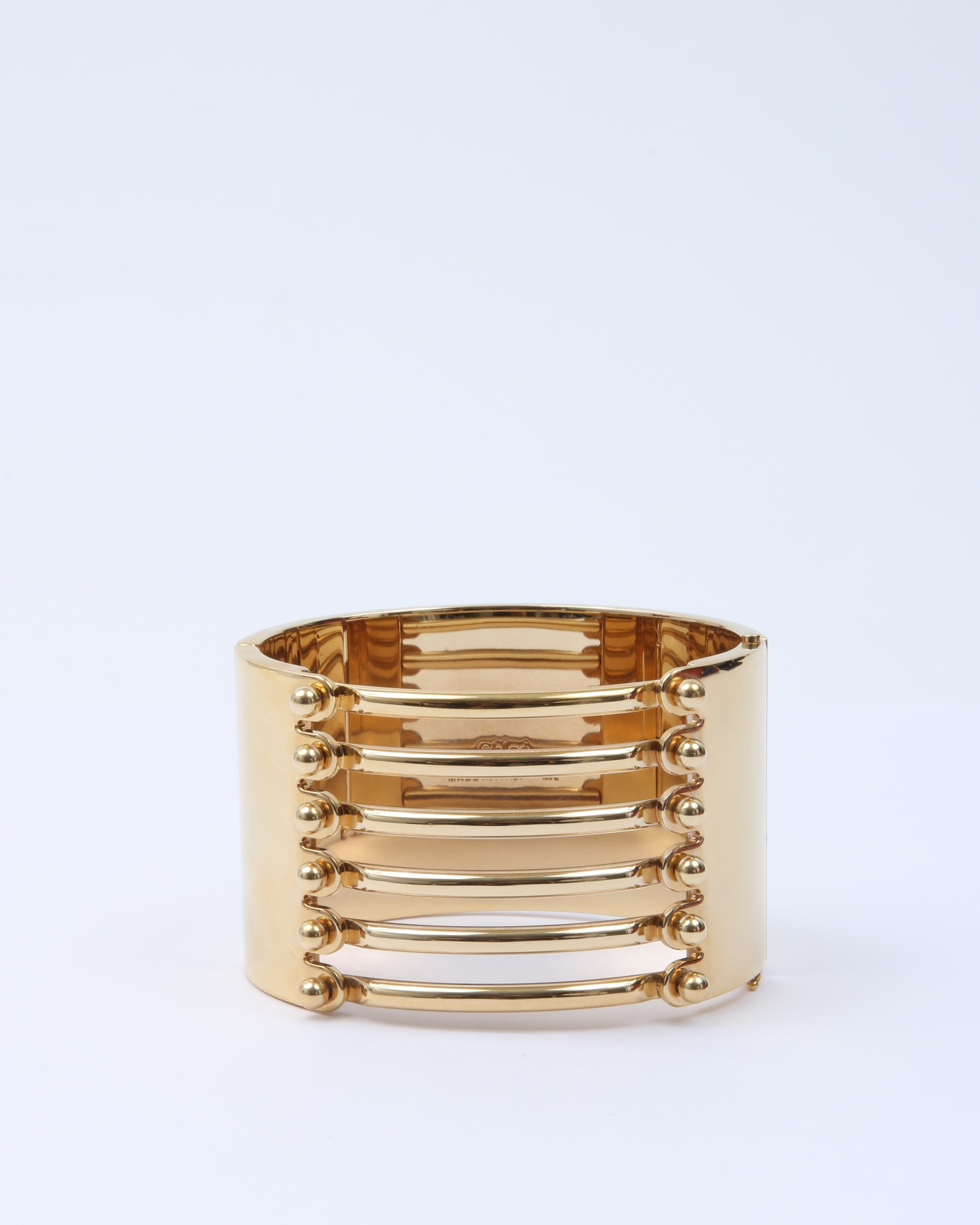 Explore a Chloe Gold Wide Bangle Bracelet - Authenticated Pre