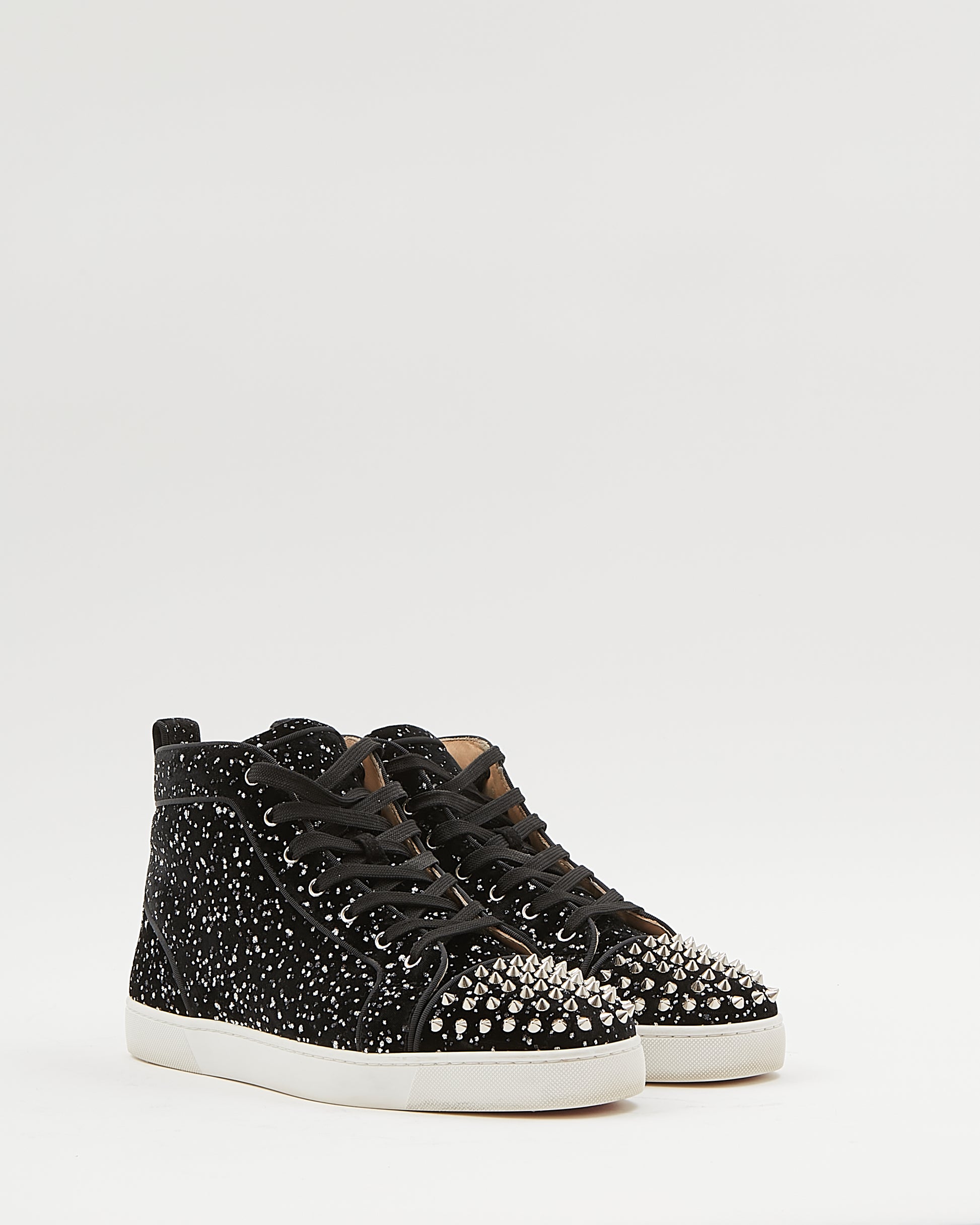 Explore a Louboutin Black Lou Spikes Orlato Flat High Top Sneakers