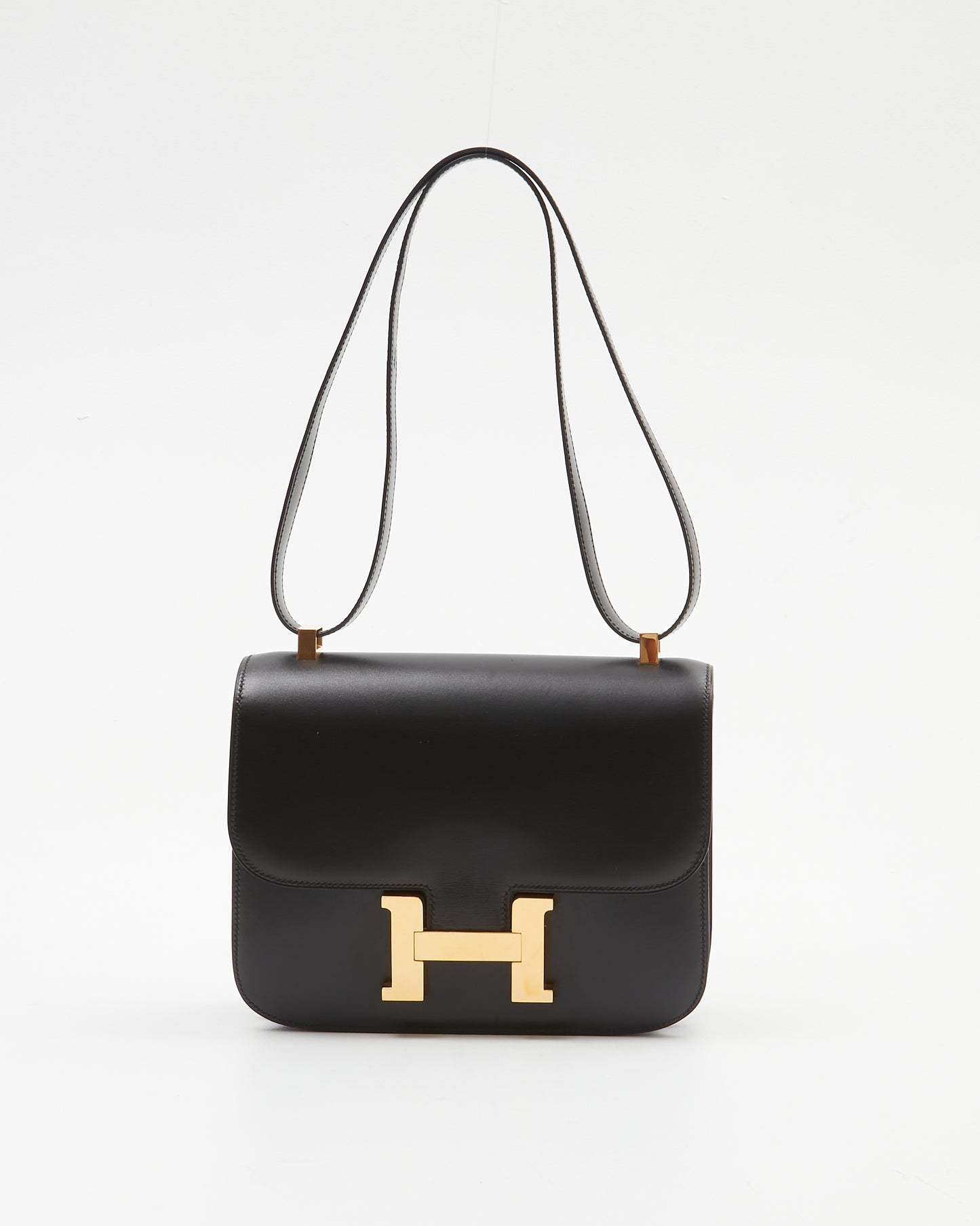 Explore a Hermès Black Box Leather Constance 23 Bag