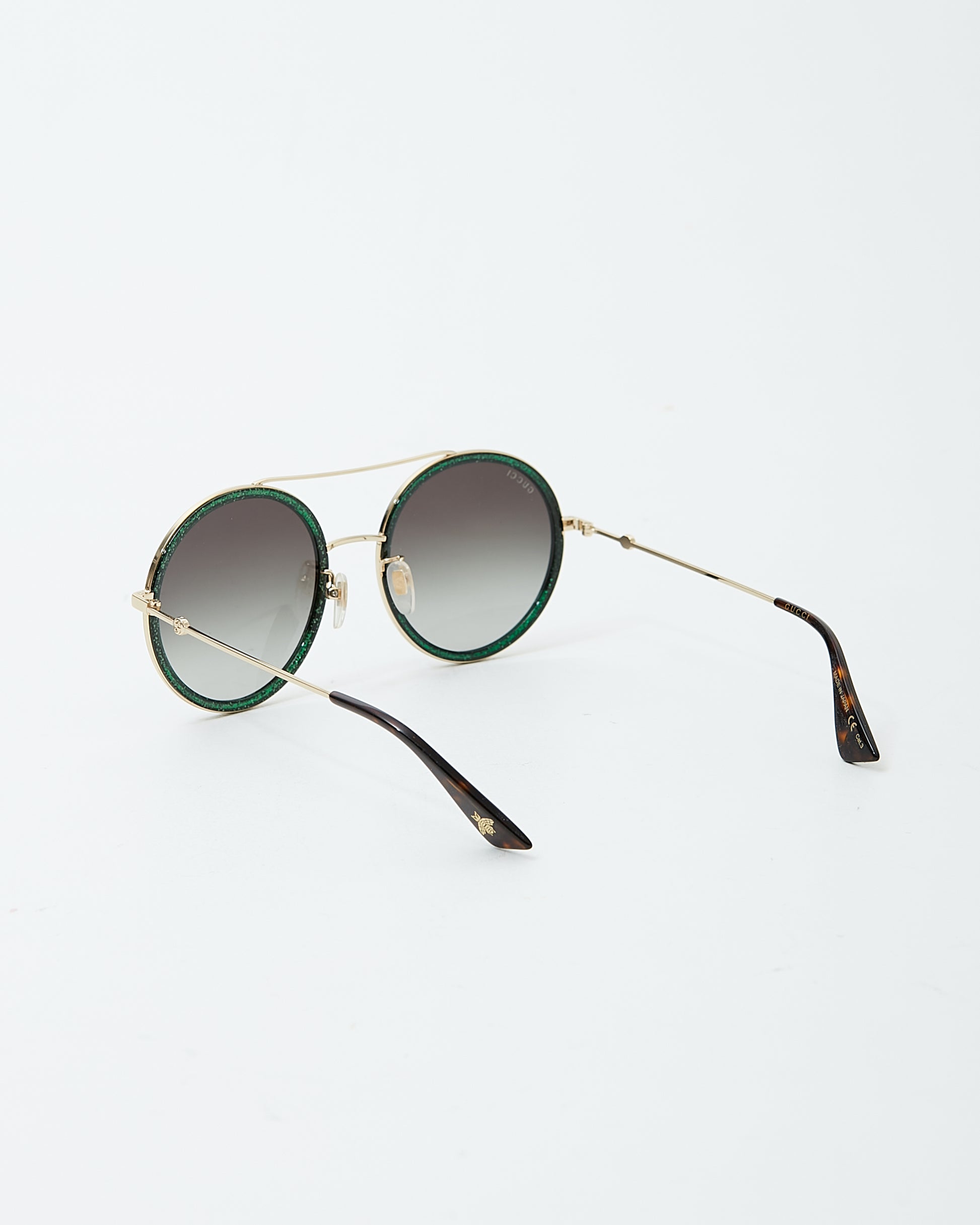 Explore a Gucci Red/Green Sparkle GG0061S Round Aviator Sunglasses