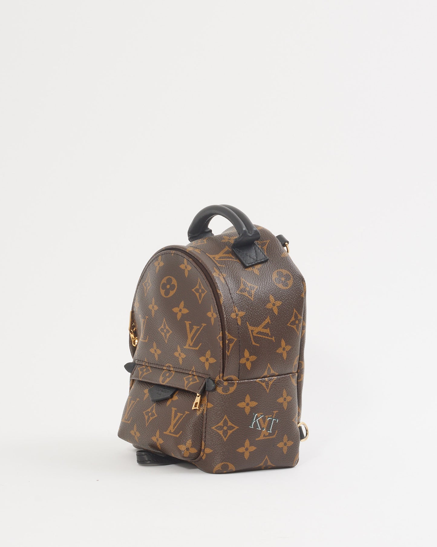 Louis Vuitton Mini sac à dos Palm Springs en toile enduite monogramme 