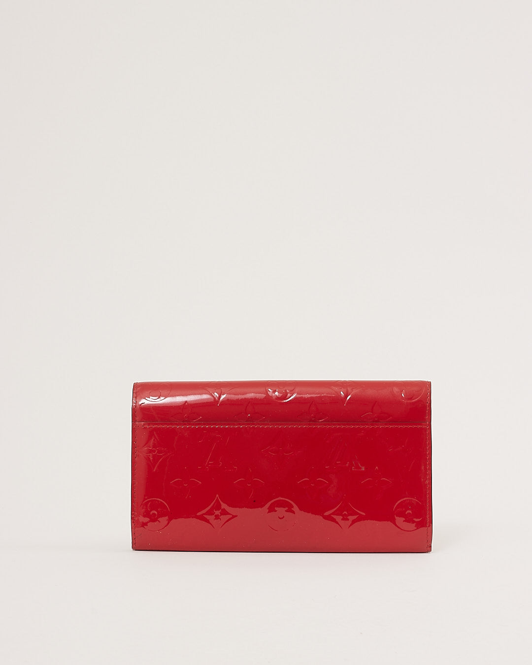 Explore a Louis Vuitton Red Vernis Monogram Sarah Wallet