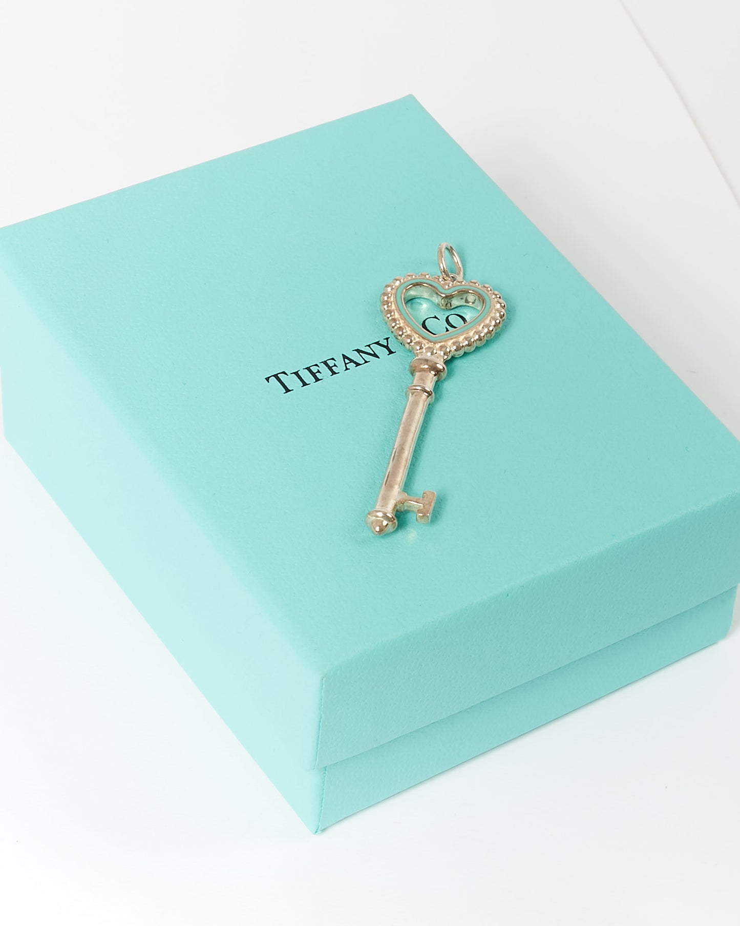 Tiffany & Co. Sterling Silver Blue Enamel Heart Shaped Key Pendant