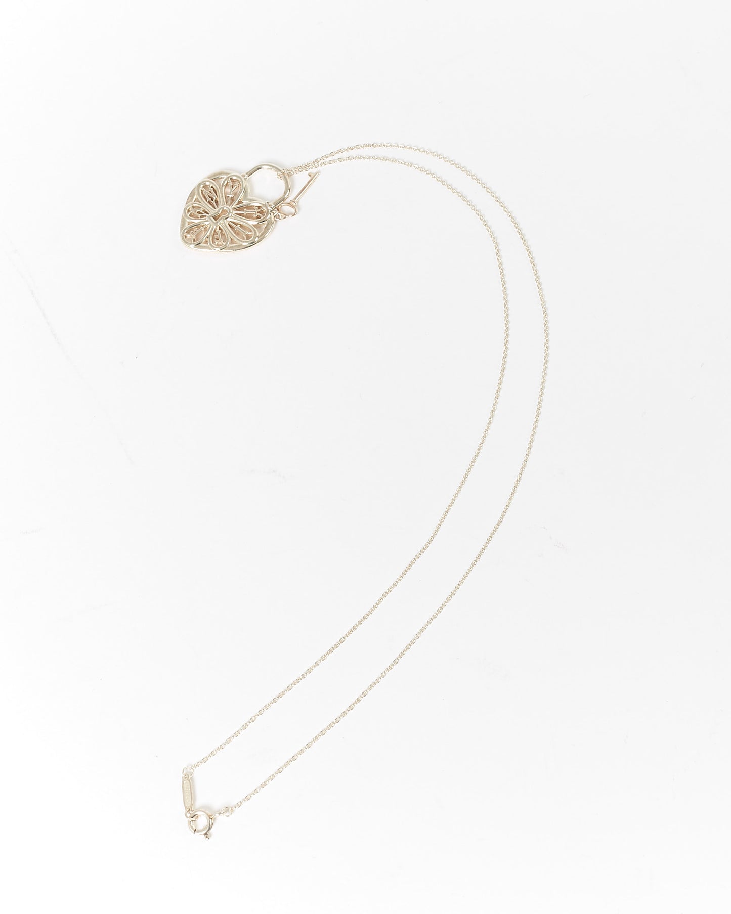 Tiffany &amp; Co. Serrure à clé en forme de cœur en filigrane en argent sterling