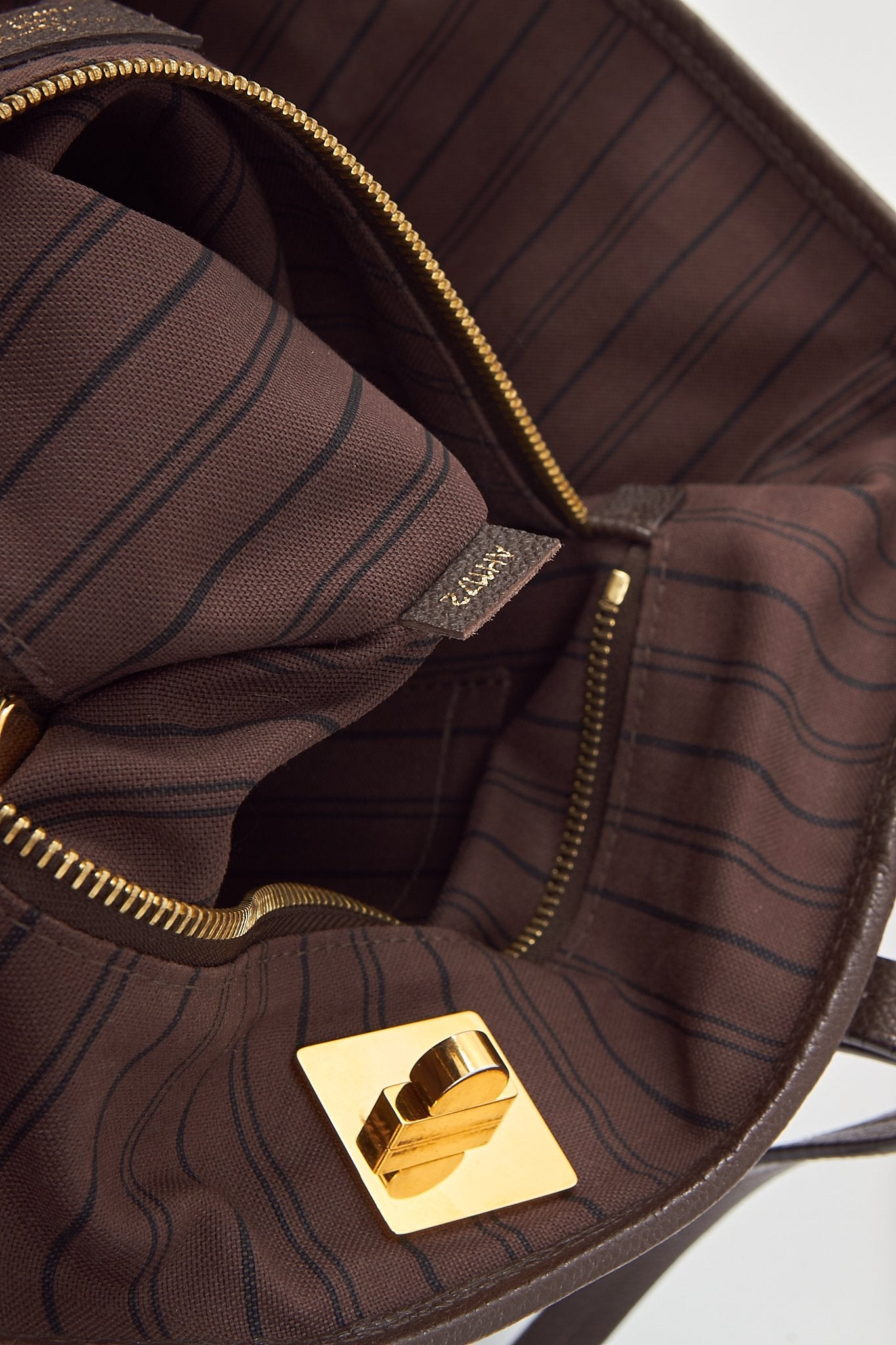 Louis Vuitton Sac cabas Empreinte Citanide PM en cuir marron