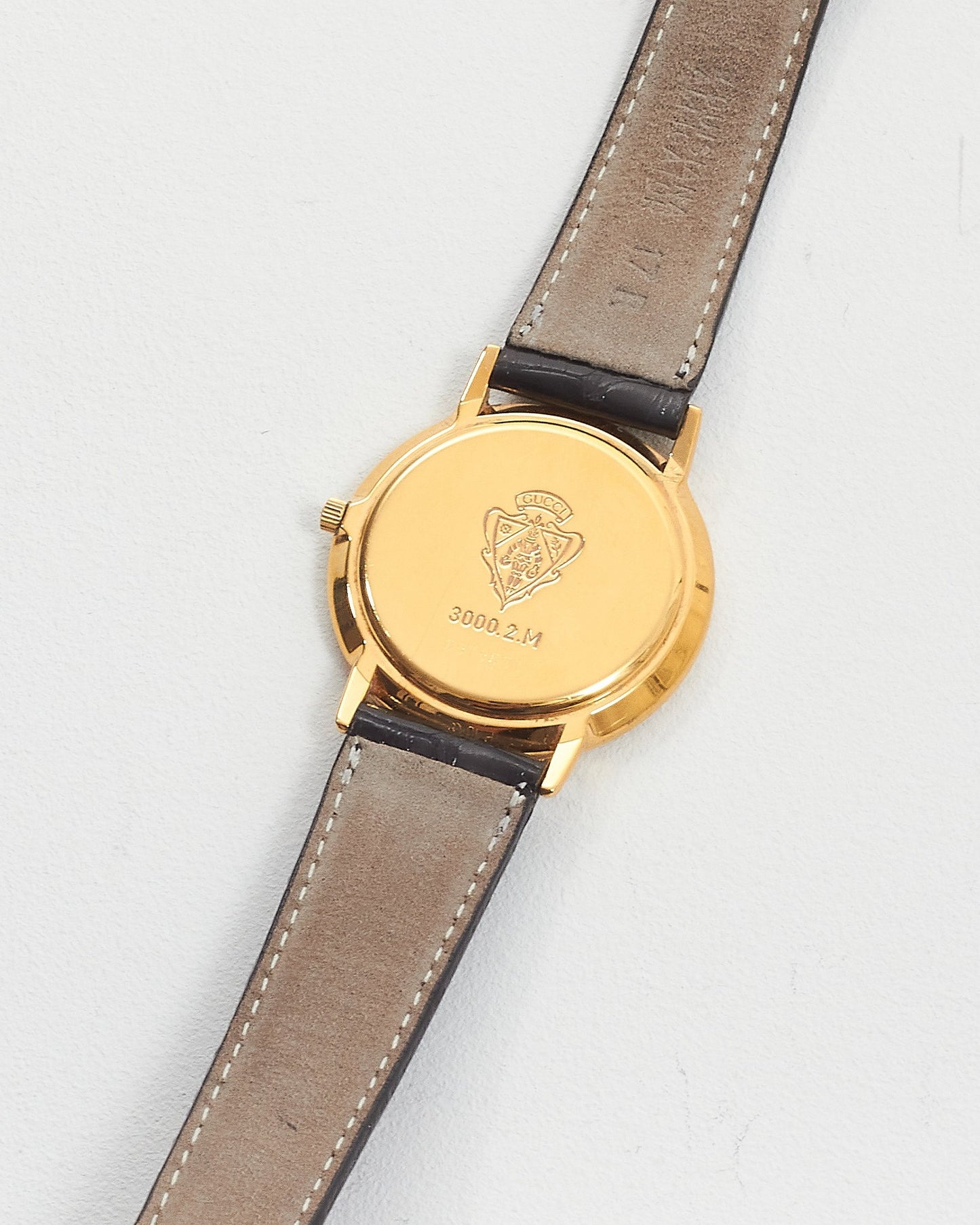 Montre Gucci Vintage avec bracelet en cuir d'alligator doré/noir